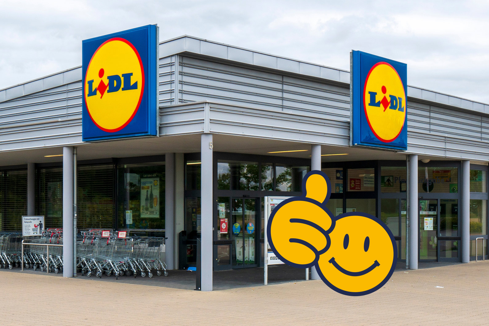 Ein Lidl-Markt. Davor ein Smiley mit einem Daumen nach oben für Zustimmung