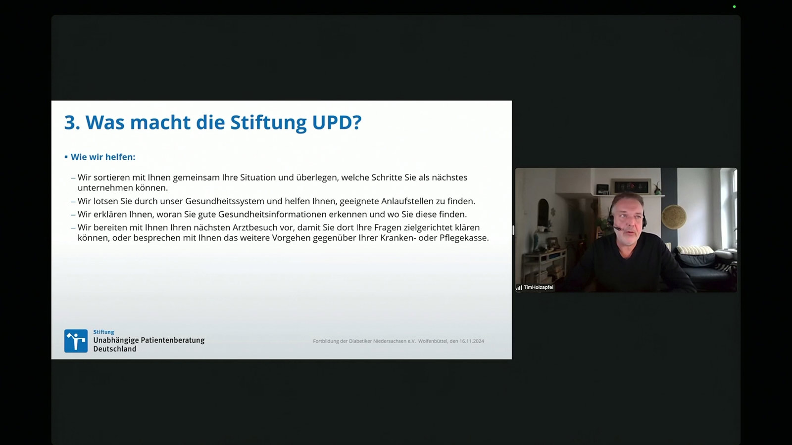 Tim Holzapfel von der UPD im Vortrag.